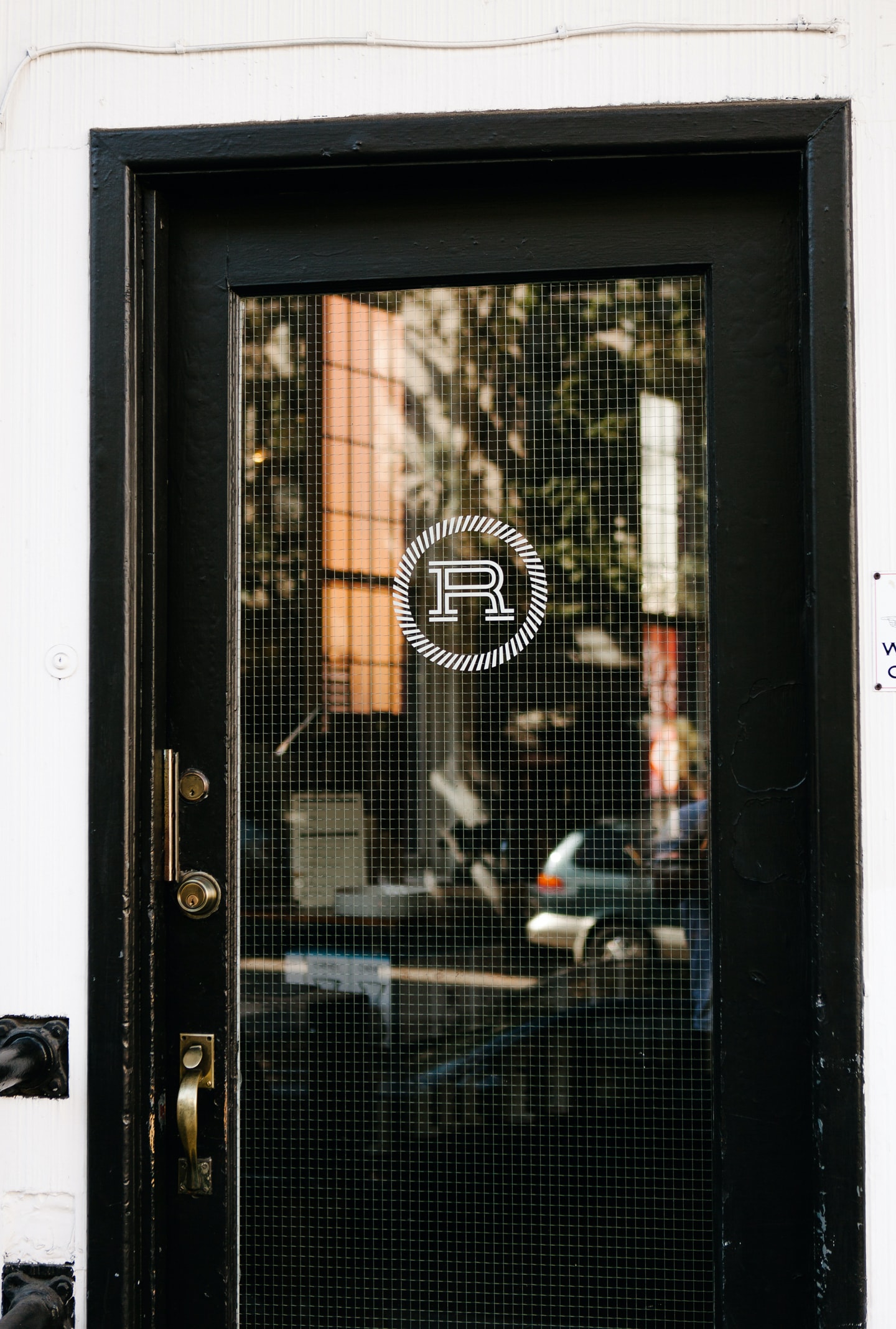 Revolver cafe door mark