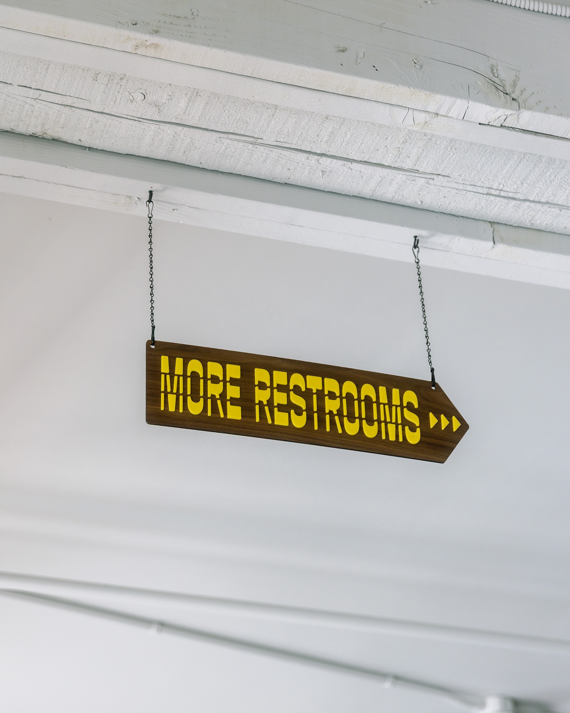 "More Restrooms" sign